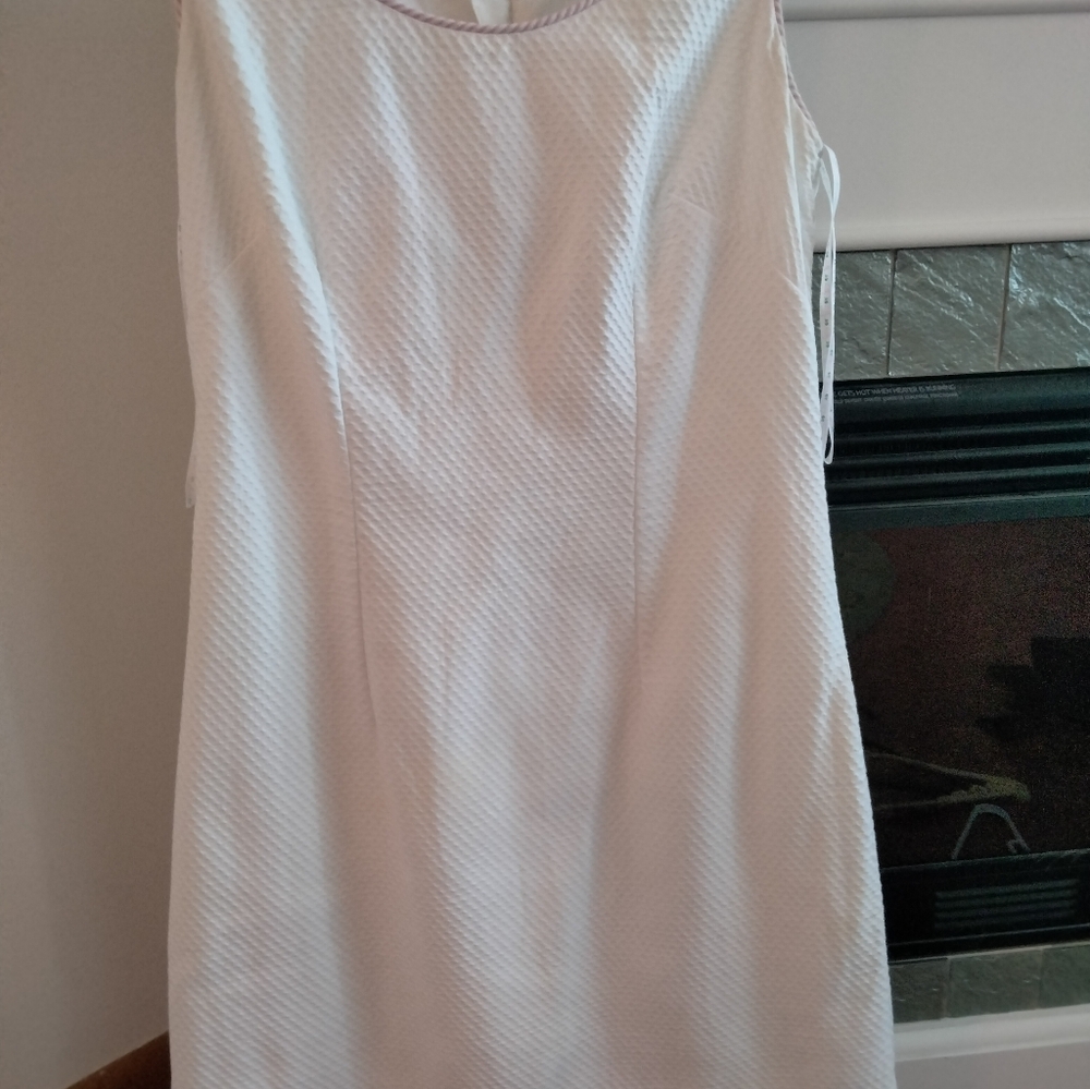 Lilly Pulitzer white with pink trim. So cute.